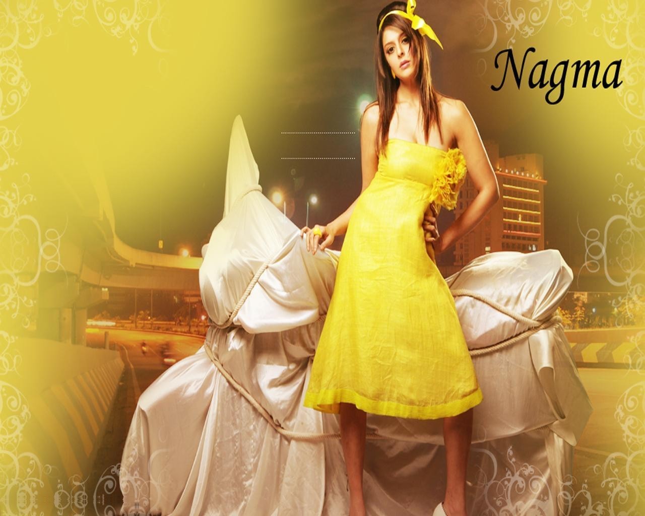 Nagma Actress Yellow Dress Pictures