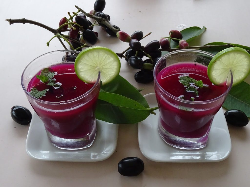 Black Plum Juice And Fruit Photos
