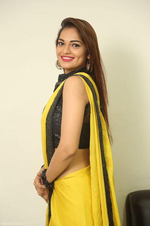 Ashwini Yellow Saree Smile Pose Pictures