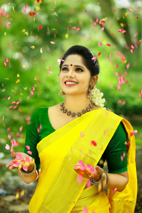 Samarthya Nedimaram Yellow Saree Pictures